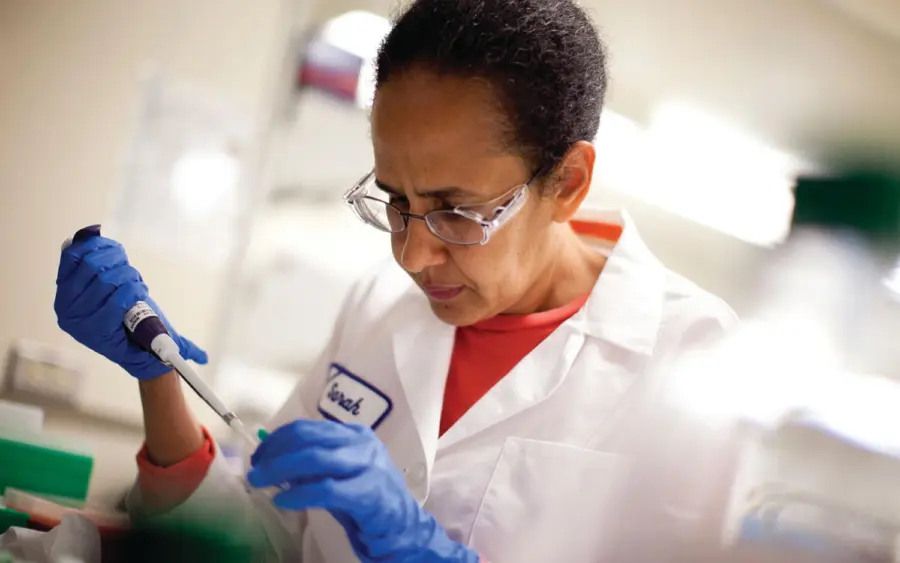 A scientist runs tests on samples